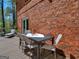 Deck with table and chairs, ideal for outdoor entertaining and dining at 2270 Emerald Dr, Jonesboro, GA 30236