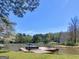 Lakeside dock with boat lift and an outdoor seating area, great for relaxing at 2270 Emerald Dr, Jonesboro, GA 30236
