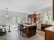 Spacious kitchen with an island, stainless steel appliances, and access to an outdoor area at 2270 Emerald Dr, Jonesboro, GA 30236