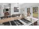 Gourmet kitchen boasts a large island with a cooktop, breakfast bar, and deck access for seamless indoor-outdoor living at 2270 Emerald Dr, Jonesboro, GA 30236