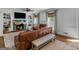 Inviting living room with brown leather furniture, built-in shelving, and decorative fireplace with television at 2270 Emerald Dr, Jonesboro, GA 30236