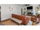 Living room featuring a brick fireplace with light-blue trim and built-in shelving at 2270 Emerald Dr, Jonesboro, GA 30236