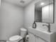 Modern powder room featuring a vessel sink and sleek fixtures at 2270 Emerald Dr, Jonesboro, GA 30236