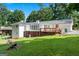 Back exterior of home with deck at 3210 Roseheath Ln, Lithonia, GA 30038