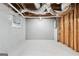 Exposed ceiling and wall supports in unfinished basement at 3210 Roseheath Ln, Lithonia, GA 30038