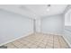Neutral basement with tiled floors and white trim at 3210 Roseheath Ln, Lithonia, GA 30038