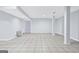 Unfinished basement with tiled flooring at 3210 Roseheath Ln, Lithonia, GA 30038