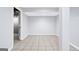 Unfinished basement with a tile floor and a doorway at 3210 Roseheath Ln, Lithonia, GA 30038