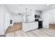Open-concept kitchen and living room; great for entertaining and modern living at 3210 Roseheath Ln, Lithonia, GA 30038