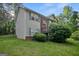 Charming two-story home with a combination of siding and brick exterior, complemented by a well-maintained lawn at 8915 Tweeddale Dr, Winston, GA 30187