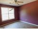 Bedroom featuring a ceiling fan and natural light from window at 1306 Stonemont Rd, Auburn, GA 30011