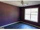 Bedroom featuring a ceiling fan and natural light from window at 1306 Stonemont Rd, Auburn, GA 30011