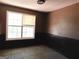 Dining room with tile floors and a large window at 1306 Stonemont Rd, Auburn, GA 30011