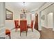 Charming dining room featuring a round table, upholstered chairs, and elegant decor at 395 Sylvan Loop, Fayetteville, GA 30214