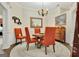 Cozy dining room with round table, upholstered chairs, and decorative accents at 395 Sylvan Loop, Fayetteville, GA 30214