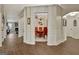 Elegant dining room with hardwood floors, decorative pillars, and a chandelier at 395 Sylvan Loop, Fayetteville, GA 30214
