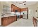Updated kitchen featuring granite countertops, stainless steel appliances, and a functional layout at 395 Sylvan Loop, Fayetteville, GA 30214