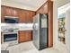 Kitchen featuring stainless steel appliances, ample counter space, and direct access to a pantry at 395 Sylvan Loop, Fayetteville, GA 30214