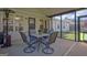 Covered patio featuring a cozy seating area, perfect for relaxing and entertaining outdoors at 395 Sylvan Loop, Fayetteville, GA 30214