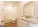 Bathroom featuring a vanity with granite countertop, tub, and shower at 1225 Hibiscus Way, Mcdonough, GA 30253