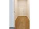 Carpeted walk-in closet with a wire shelf for ample storage at 1225 Hibiscus Way, Mcdonough, GA 30253