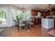 Eat-in kitchen area with bright natural light and a modern light fixture at 97 Coral Dr, Whitesburg, GA 30185
