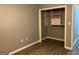 Neutral bedroom featuring a closet with built in shelves and drawers at 2119 Pine Heights Ne Dr, Atlanta, GA 30324