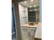 Interior shot of the wet bar area, featuring a mirror backsplash and storage at 2119 Pine Heights Ne Dr, Atlanta, GA 30324