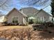 Spacious backyard featuring an outdoor patio perfect for relaxing and entertaining at 12313 Riviera Dr, Fayetteville, GA 30215