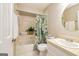 Cozy bathroom featuring a shower and bath, vanity with sink, and floral shower curtain at 105 Lake Forest Drive, Peachtree City, GA 30269