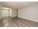 Open-concept living room showcasing new floors, neutral paint, and plenty of natural light at 105 Lake Forest Drive, Peachtree City, GA 30269