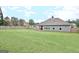 Large, well-maintained backyard with a wood fence, perfect for outdoor activities and relaxation at 234 Thyme Leaf Way, Locust Grove, GA 30248
