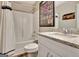 Full bathroom featuring a modern vanity, granite countertops, and a shower/tub combo at 234 Thyme Leaf Way, Locust Grove, GA 30248