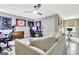 Bright game room showcasing the comfortable furniture and gaming setup at 234 Thyme Leaf Way, Locust Grove, GA 30248