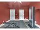 Spacious home gym with ample room for equipment and a mirrored display at 234 Thyme Leaf Way, Locust Grove, GA 30248