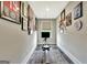 Hallway with a rowing machine, leading to another room at 234 Thyme Leaf Way, Locust Grove, GA 30248