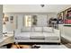 Cozy living room featuring a comfortable couch, and neutral décor at 234 Thyme Leaf Way, Locust Grove, GA 30248
