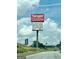 Tanger Outlet stores sign on a sunny day, conveniently located for shoppers at 234 Thyme Leaf Way, Locust Grove, GA 30248