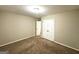 Standard bedroom with closet and neutral paint at 2239 Nelms Sw Dr, Atlanta, GA 30315