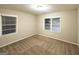 Bedroom with plush carpet flooring and natural light at 2239 Nelms Sw Dr, Atlanta, GA 30315
