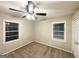 Well-lit bedroom showcasing wood-look blinds and plush carpet at 2239 Nelms Sw Dr, Atlanta, GA 30315