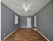 Bonus room with hardwood flooring and multiple points of egress at 1150 Goldsmith Rd, Stone Mountain, GA 30083