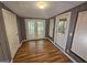 Sunroom with three doors and multiple windows at 1150 Goldsmith Rd, Stone Mountain, GA 30083
