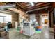 Unfinished basement with exposed ceiling and mixed flooring, providing a canvas for various activities at 1655 Stacia Dr, Covington, GA 30016