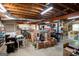 Unfinished basement with exposed ceiling, storage boxes, and utilities, offering potential for customization at 1655 Stacia Dr, Covington, GA 30016