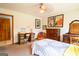 Charming bedroom features a ceiling fan, neutral walls, and a cozy layout to create a comfortable personal space at 1655 Stacia Dr, Covington, GA 30016