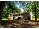 Lovely brick home with a large front porch and beautifully landscaped yard at 1655 Stacia Dr, Covington, GA 30016