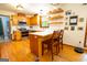 Eat-in kitchen features wooden cabinets, stainless steel appliances, and an island with seating at 1655 Stacia Dr, Covington, GA 30016