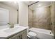 Bathroom featuring a white vanity, tiled shower and tub combo at 1058 Kirkland Cir, Smyrna, GA 30080