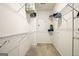Walk-in closet with wire shelves and neutral walls and carpet at 1058 Kirkland Cir, Smyrna, GA 30080